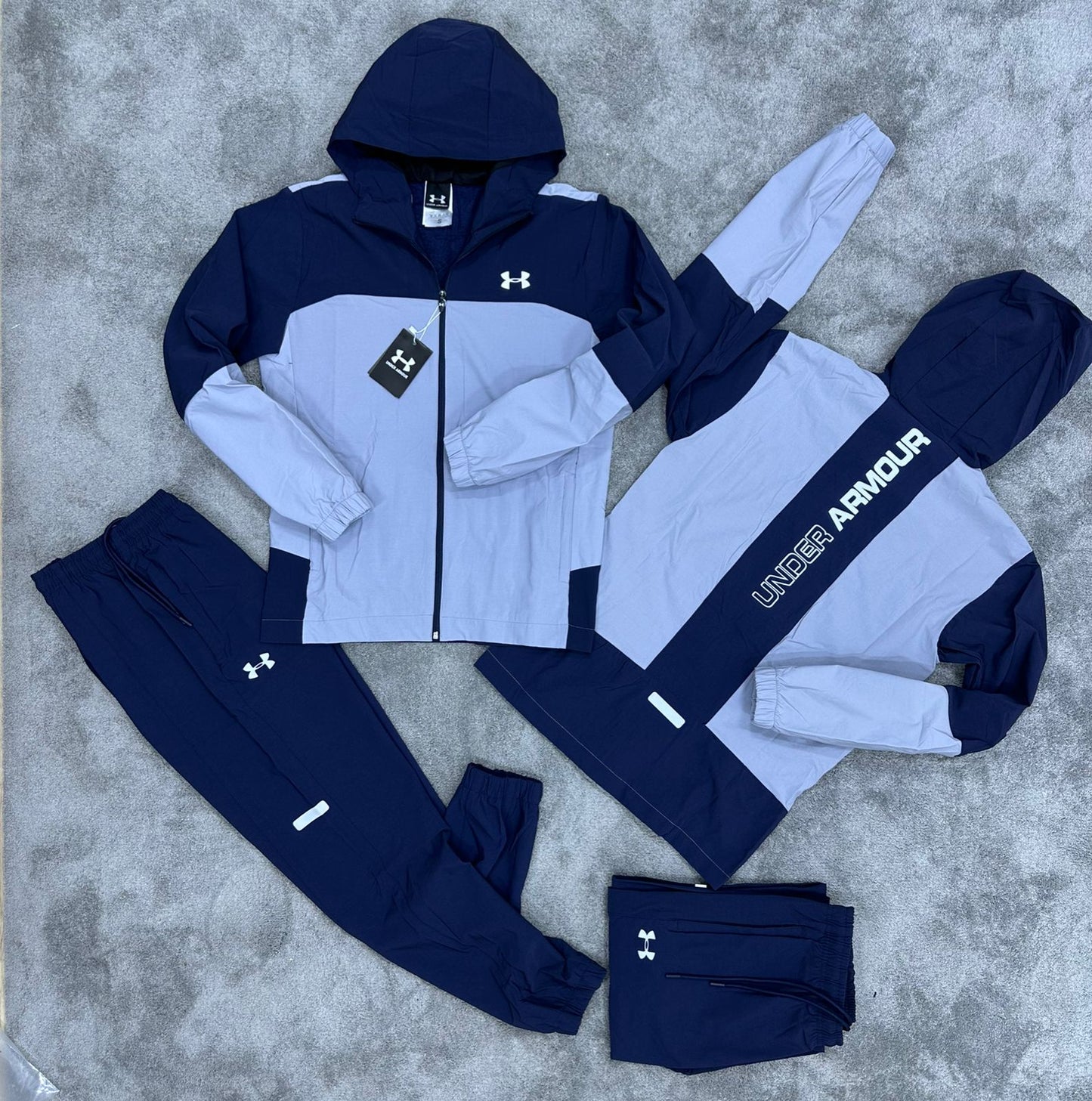 UNDER ARMOUR • BLANCO/AZUL