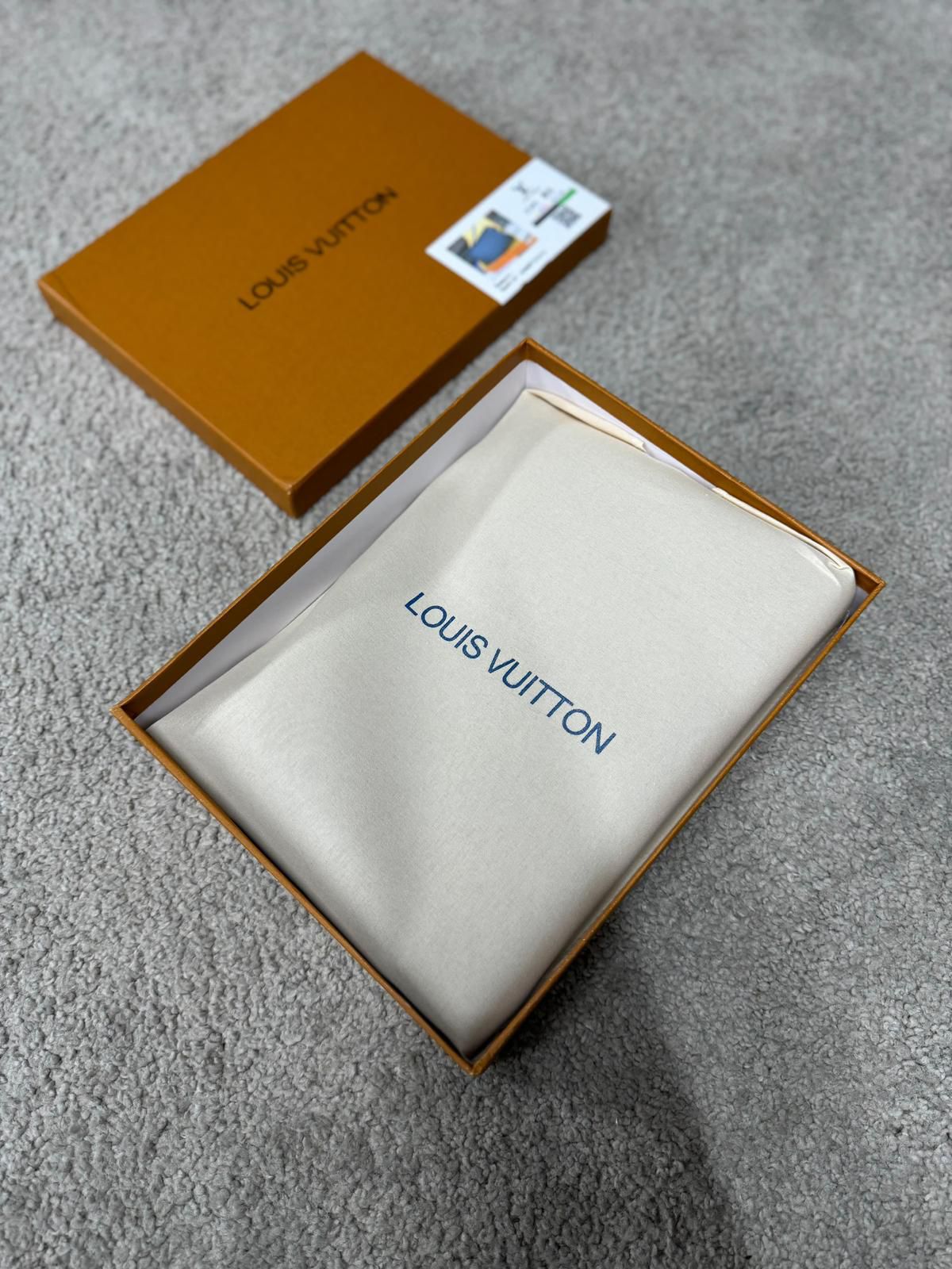 BOLSITO MANO • LOUIS VUITTON